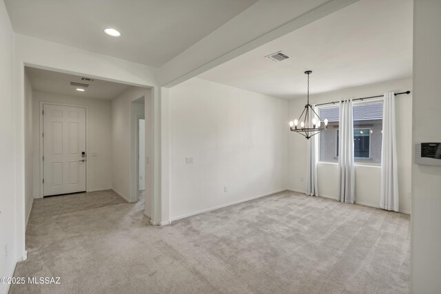 9569 N Sage Vista Ct, Tucson, AZ 85742 - unfurnished room with light carpet, a chandelier, baseboards, and recessed lighting