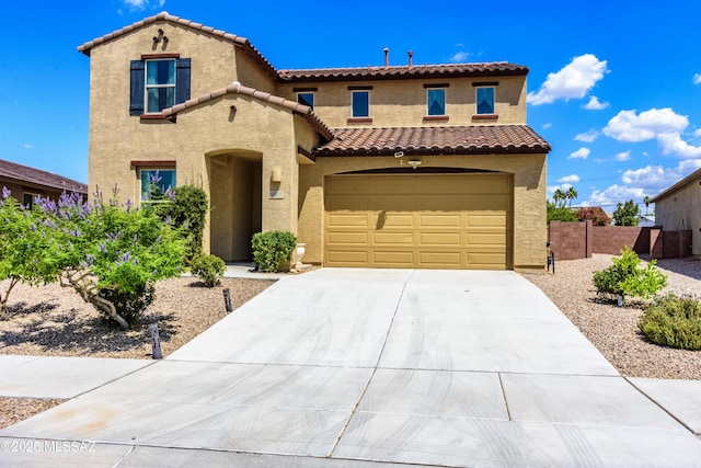 9569 N Sage Vista Ct, Tucson, AZ 85742 - mediterranean / spanish house with driveway, stucco siding, a tile roof, and an attached garage