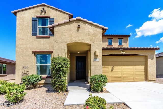 9569 N Sage Vista Ct, Tucson, AZ 85742 - view of front facade with stucco siding, a tiled roof, and concrete driveway