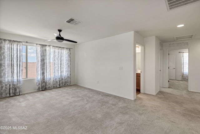 9569 N Sage Vista Ct, Tucson, AZ 85742 - carpeted empty room with ceiling fan, baseboards, and attic access
