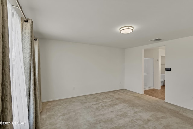 9569 N Sage Vista Ct, Tucson, AZ 85742 - carpeted empty room featuring baseboards