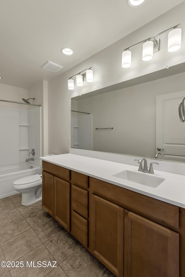 9569 N Sage Vista Ct, Tucson, AZ 85742 - bathroom with vanity, tile patterned floors, toilet, and shower / tub combination