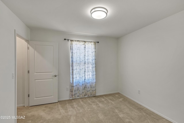 9569 N Sage Vista Ct, Tucson, AZ 85742 - empty room with light carpet and baseboards