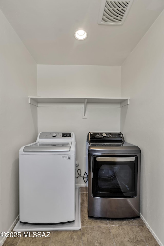 9569 N Sage Vista Ct, Tucson, AZ 85742 - washroom featuring independent washer and dryer, baseboards, recessed lighting, and tile patterned floors