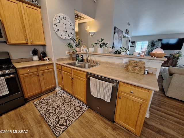 4396 S Valley Rd, Tucson, AZ 85714 - kitchen featuring dishwasher, stove, open floor plan, a sink, and a peninsula