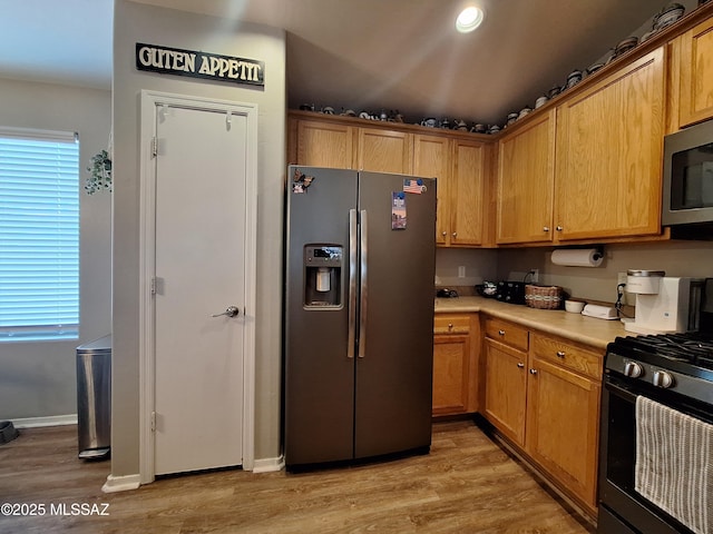4396 S Valley Rd, Tucson, AZ 85714 - kitchen featuring appliances with stainless steel finishes, light wood-style floors, light countertops, baseboards, and recessed lighting