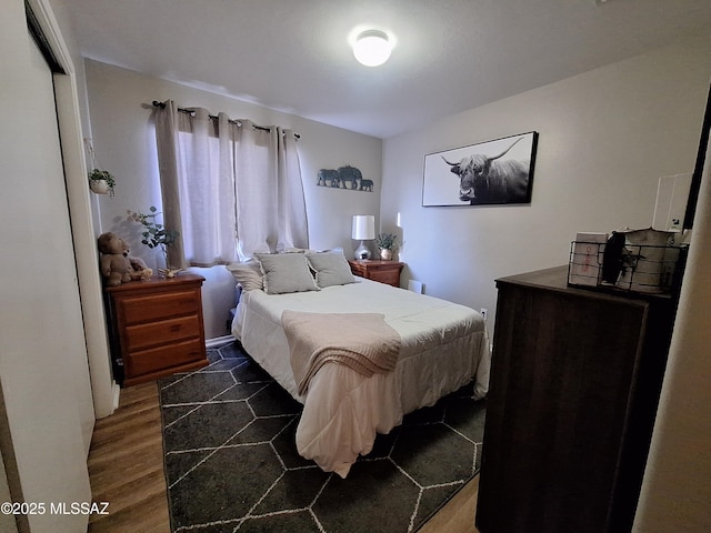 4396 S Valley Rd, Tucson, AZ 85714 - bedroom with dark wood-style flooring