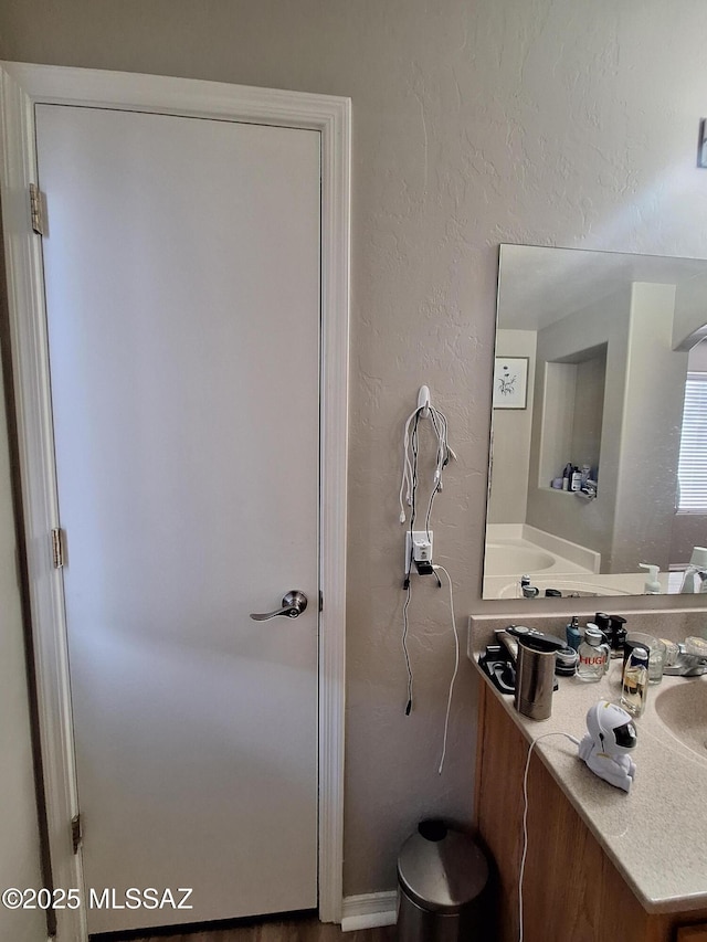 4396 S Valley Rd, Tucson, AZ 85714 - bathroom featuring vanity and a textured wall
