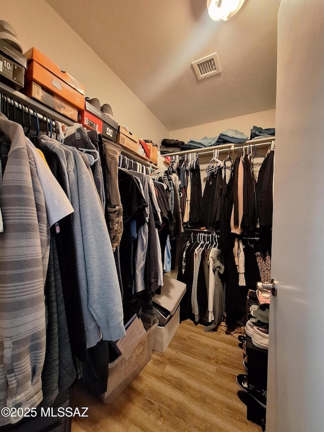 4396 S Valley Rd, Tucson, AZ 85714 - walk in closet with wood finished floors