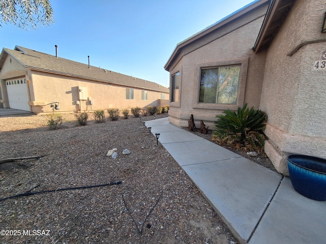 4396 S Valley Rd, Tucson, AZ 85714 - view of home's exterior featuring stucco siding
