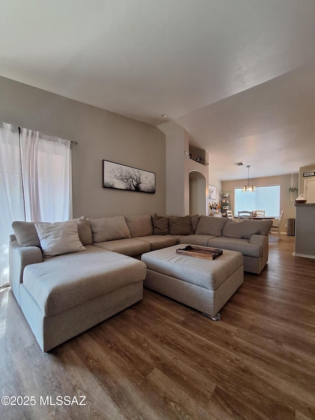 4396 S Valley Rd, Tucson, AZ 85714 - living room featuring a chandelier and dark wood-style floors