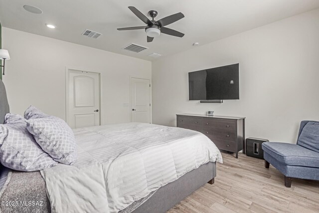 16800 S Paseo Las Vigas, Sahuarita, AZ 85629 - bedroom featuring light wood-style flooring, a ceiling fan, and recessed lighting