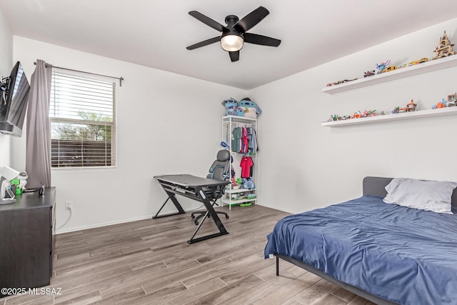 16800 S Paseo Las Vigas, Sahuarita, AZ 85629 - bedroom featuring wood finished floors, baseboards, and a ceiling fan