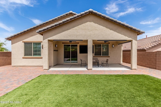 16800 S Paseo Las Vigas, Sahuarita, AZ 85629 - rear view of house featuring ceiling fan, stucco siding, and a patio