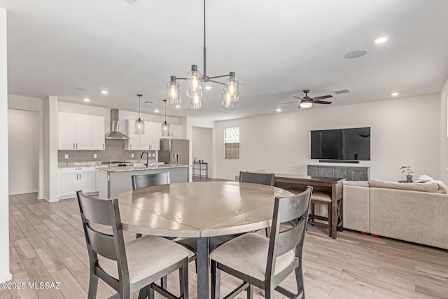 16800 S Paseo Las Vigas, Sahuarita, AZ 85629 - dining space with light wood-type flooring, ceiling fan, and recessed lighting