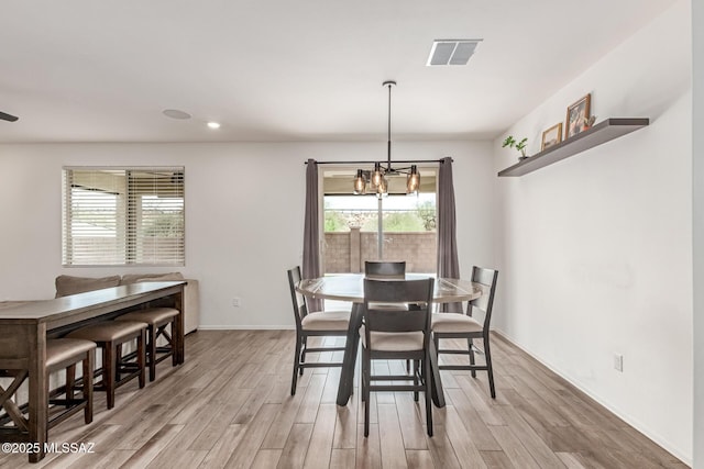 16800 S Paseo Las Vigas, Sahuarita, AZ 85629 - dining space featuring plenty of natural light, light wood finished floors, a chandelier, recessed lighting, and baseboards