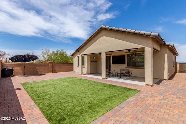 16800 S Paseo Las Vigas, Sahuarita, AZ 85629 - rear view of house featuring stucco siding, a patio, and ceiling fan