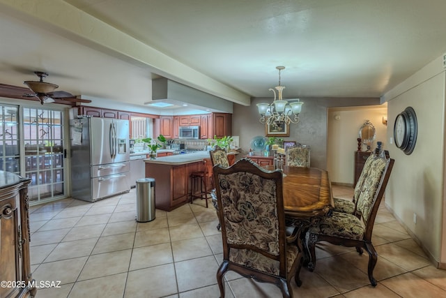 5457 S 13th Ave, Tucson, AZ 85706 - dining room featuring a chandelier, light tile patterned floors, and ceiling fan