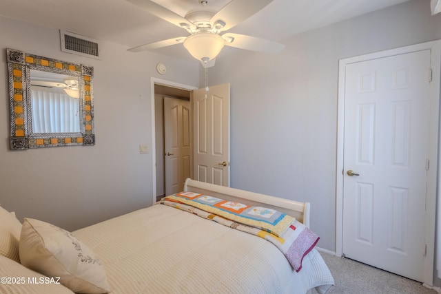 5457 S 13th Ave, Tucson, AZ 85706 - bedroom with light carpet and a ceiling fan