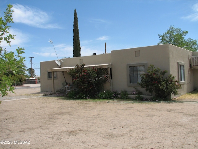 277 N Bowie Ave, Willcox, AZ 85643 - pueblo revival-style home with stucco siding