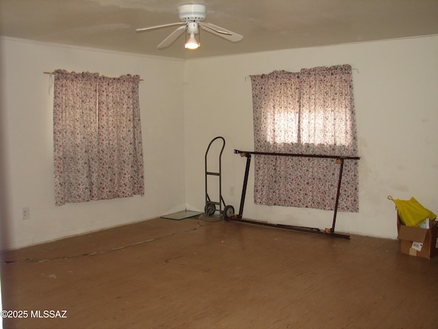 277 N Bowie Ave, Willcox, AZ 85643 - unfurnished room featuring a ceiling fan and wood finished floors