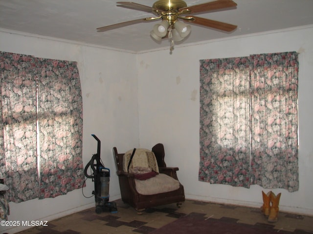 277 N Bowie Ave, Willcox, AZ 85643 - living area featuring a ceiling fan and ornamental molding