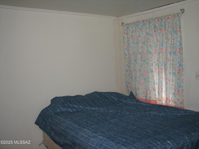 277 N Bowie Ave, Willcox, AZ 85643 - bedroom featuring ornamental molding