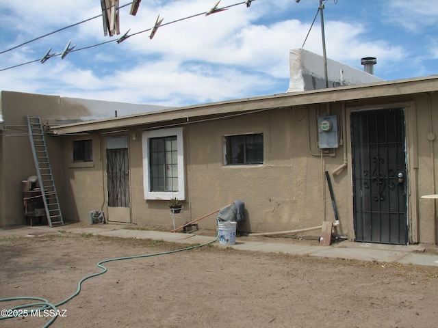 277 N Bowie Ave, Willcox, AZ 85643 - rear view of property with stucco siding