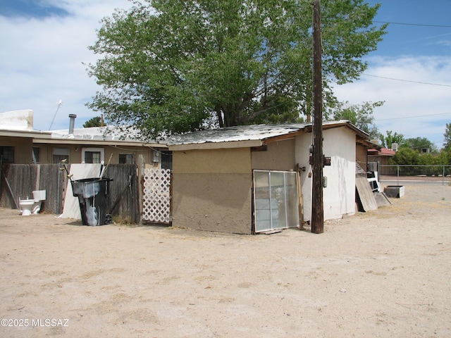 277 N Bowie Ave, Willcox, AZ 85643 - rear view of house with stucco siding