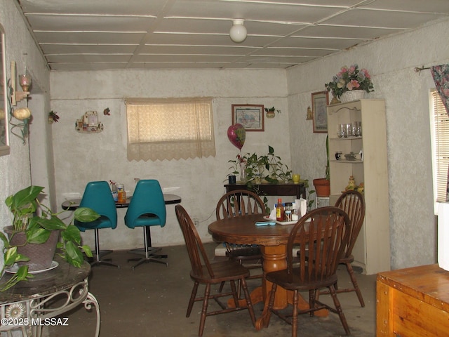 277 N Bowie Ave, Willcox, AZ 85643 - dining space with concrete flooring