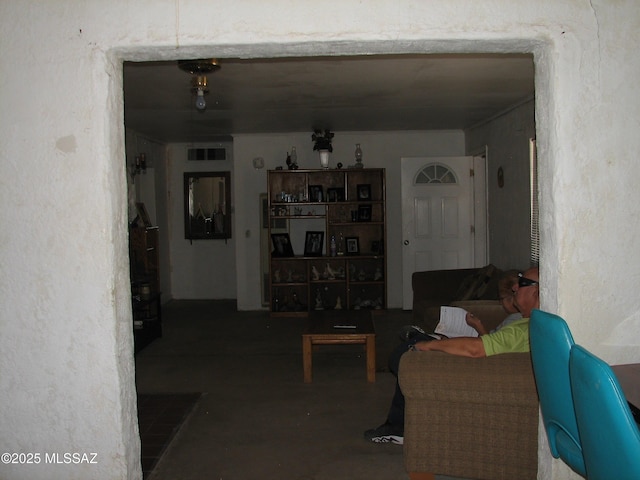 277 N Bowie Ave, Willcox, AZ 85643 - living room featuring concrete flooring