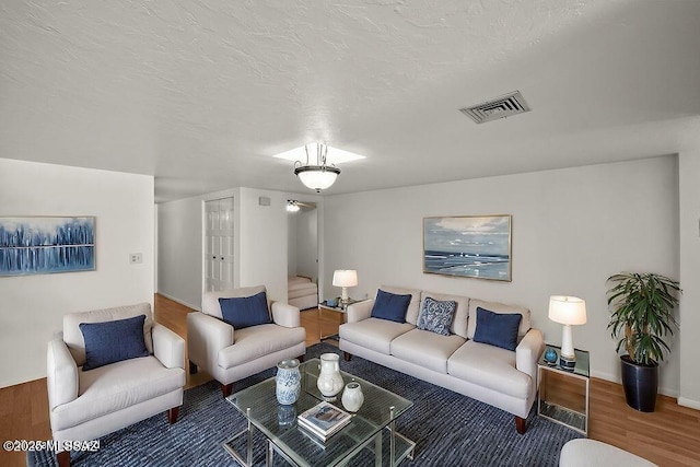 8069 E Cameo Cir, Tucson, AZ 85750 - living area with wood finished floors and baseboards