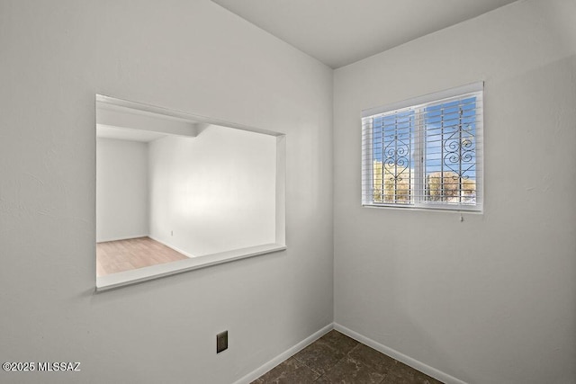 8069 E Cameo Cir, Tucson, AZ 85750 - unfurnished room featuring baseboards