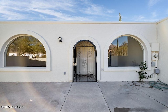 8069 E Cameo Cir, Tucson, AZ 85750 - entrance to property with stucco siding