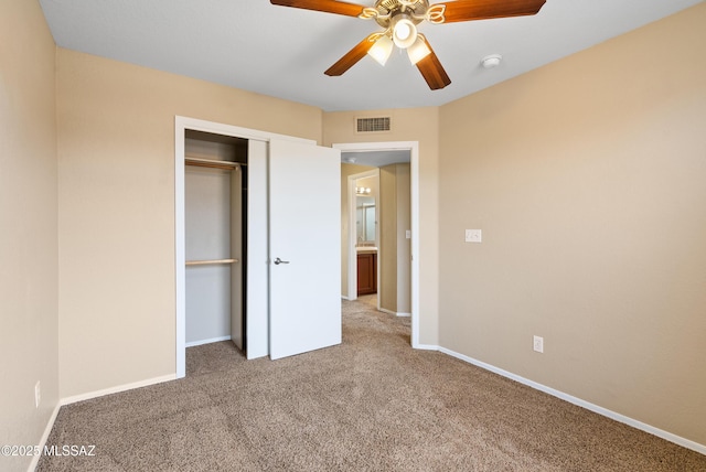 6783 W Alegria Dr, Tucson, AZ 85743 - unfurnished bedroom with carpet flooring, a closet, baseboards, and ceiling fan