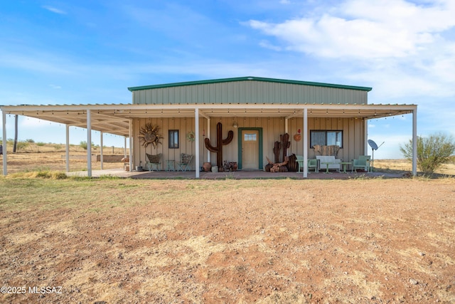 2 Sunset Dr, Elgin, AZ 85611 - rear view of property featuring board and batten siding