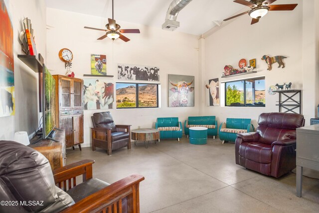 2 Sunset Dr, Elgin, AZ 85611 - living area with a ceiling fan, finished concrete flooring, and a high ceiling