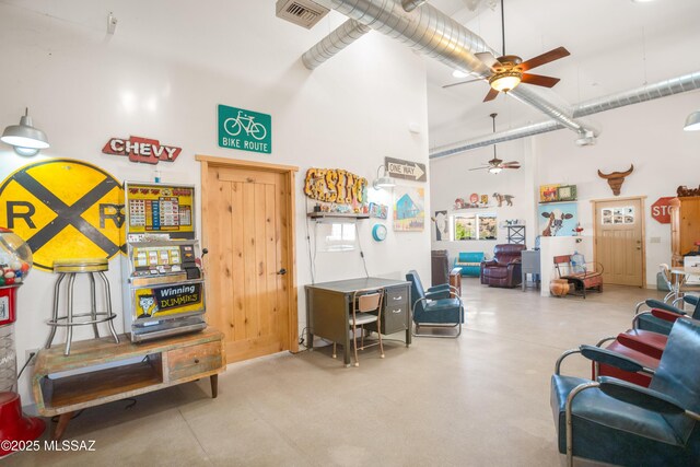 2 Sunset Dr, Elgin, AZ 85611 - living room with a towering ceiling, a ceiling fan, and finished concrete floors