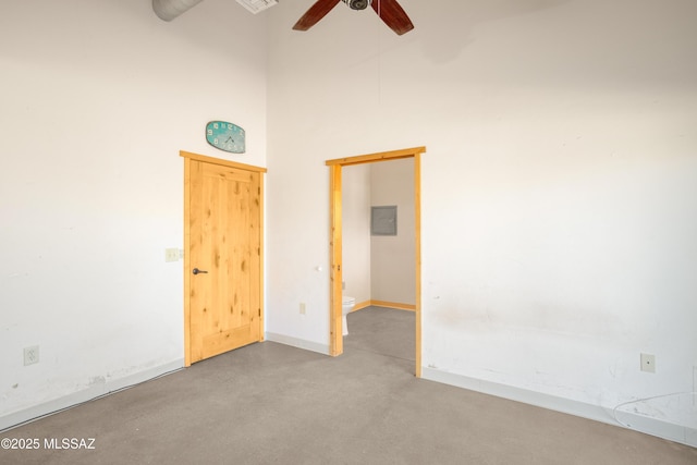2 Sunset Dr, Elgin, AZ 85611 - unfurnished room with a towering ceiling, ceiling fan, and baseboards