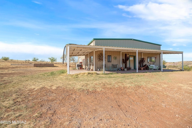 2 Sunset Dr, Elgin, AZ 85611 - back of property featuring board and batten siding