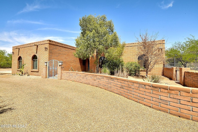 8932 N Rasmussen Ave, Tucson, AZ 85742 - view of front facade featuring brick siding