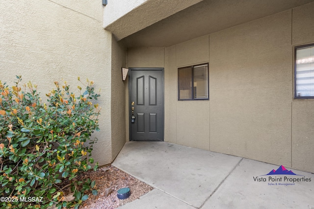 5751 N Kolb Rd # 22103, Tucson, AZ 85750 - doorway to property with stucco siding