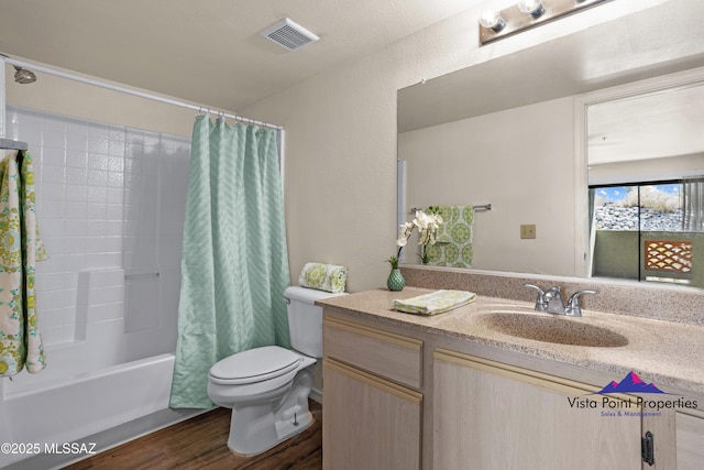 5751 N Kolb Rd # 22103, Tucson, AZ 85750 - bathroom featuring toilet, vanity, wood finished floors, and shower / bath combo with shower curtain