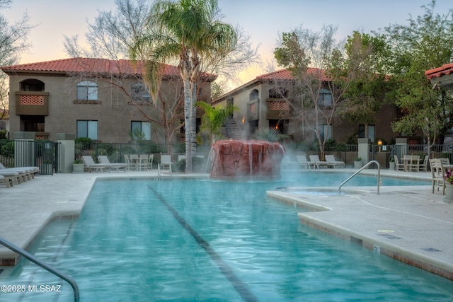 5751 N Kolb Rd # 22103, Tucson, AZ 85750 - community pool featuring a patio area