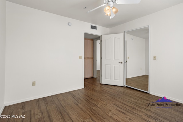 5751 N Kolb Rd # 22103, Tucson, AZ 85750 - unfurnished bedroom with wood finished floors, baseboards, and ceiling fan