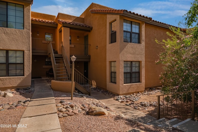 6651 N Campbell Ave Apt 221, Tucson, AZ 85718 - view of property featuring stairs