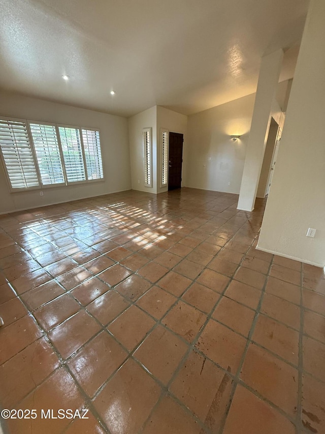 5640 N Placita Favorita, Tucson, AZ 85750 - unfurnished living room featuring tile patterned floors and recessed lighting