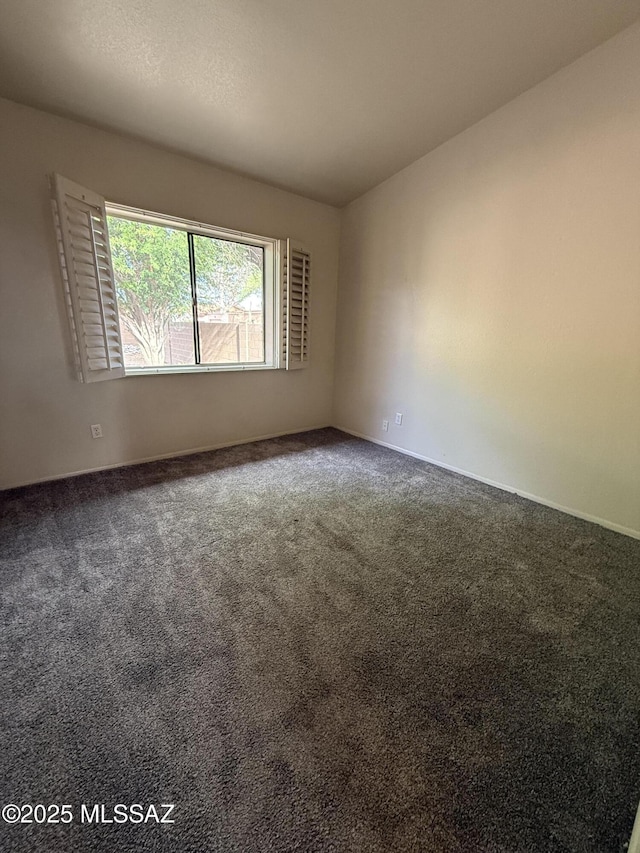 5640 N Placita Favorita, Tucson, AZ 85750 - empty room with carpet flooring and baseboards
