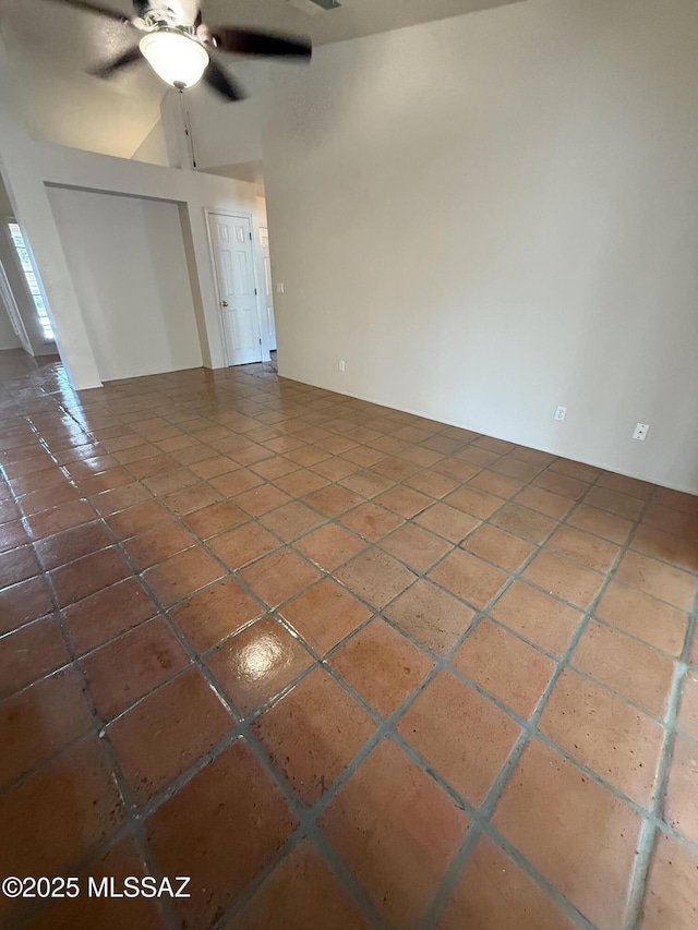 5640 N Placita Favorita, Tucson, AZ 85750 - unfurnished room with a ceiling fan and vaulted ceiling