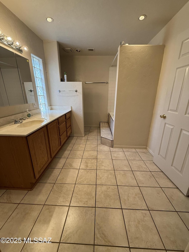 5640 N Placita Favorita, Tucson, AZ 85750 - full bath with vanity, tile patterned floors, walk in shower, and recessed lighting